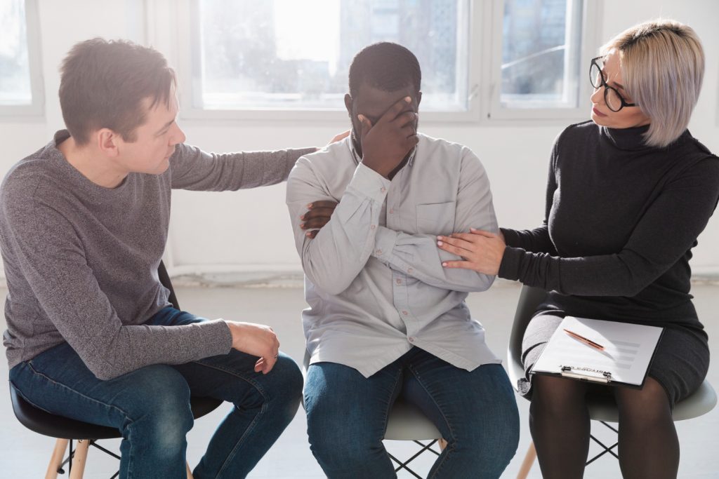 moods-n-mind-man-woman-encouraging-male-mental-health-patient